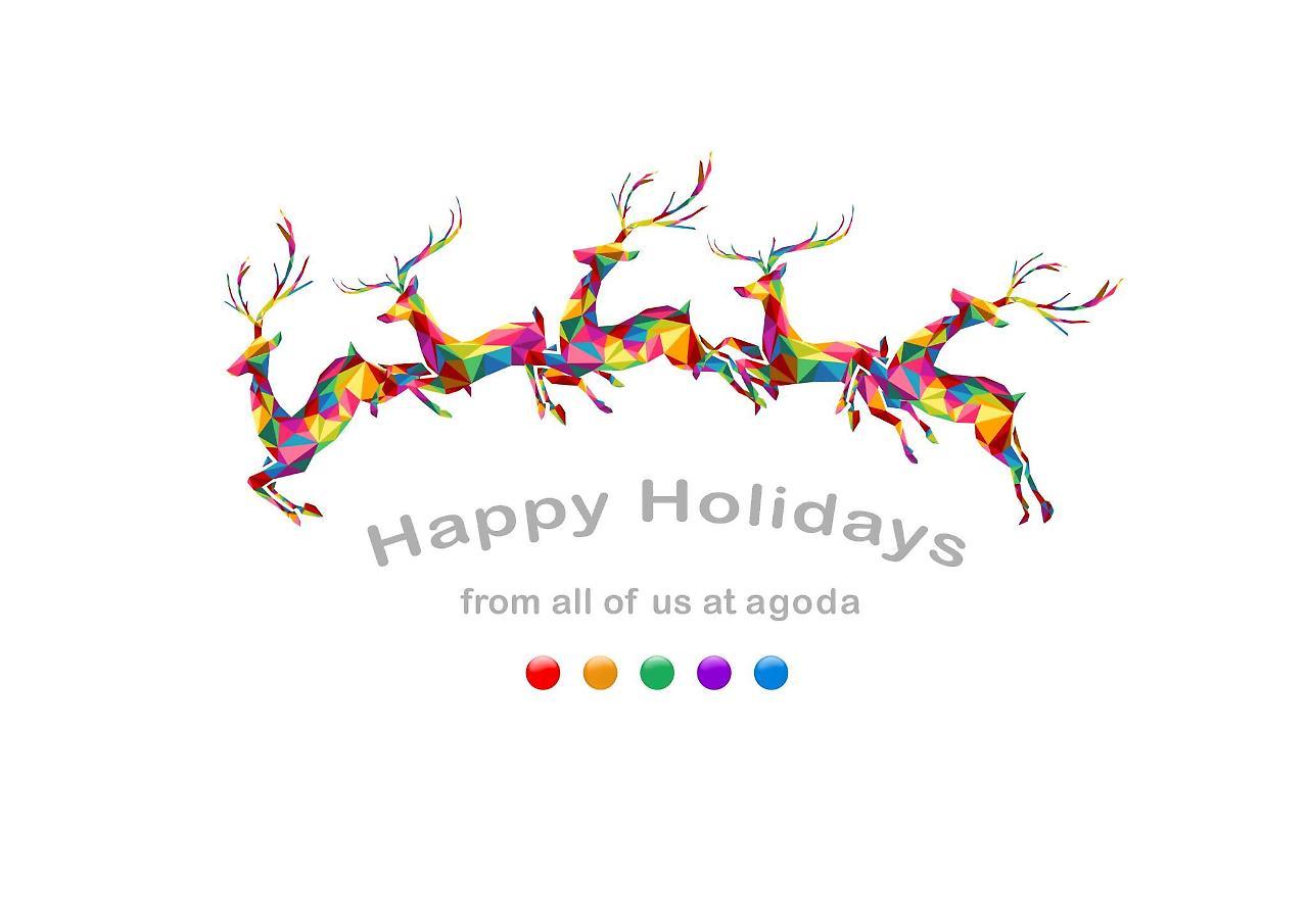 Caesar Metro Taipei Hotel Bagian luar foto The image features a colorful design of reindeer, depicted in a geometric, polygonal style. They are shown in a leaping formation against a white background. Below the reindeer, there is a festive greeting that says "Happy Holidays" followed by "from